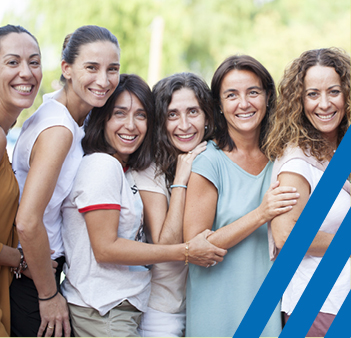 group of diverse women standing close together