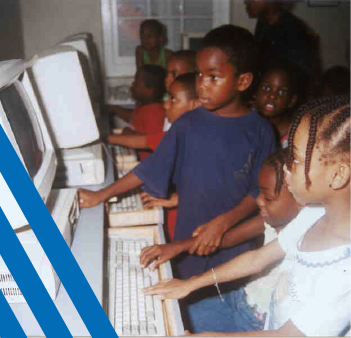 Children playing on computers together