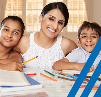 Mother and children doing homework