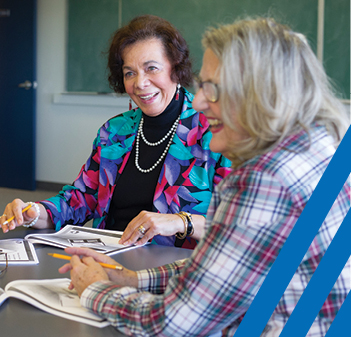 two older women in a classroom