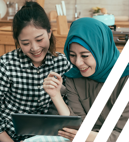 two people looking at a tablet