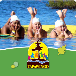 Camp Tapawingo Logo, girls laying on floatie smiling