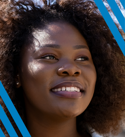 close up of smiling woman looking off camera