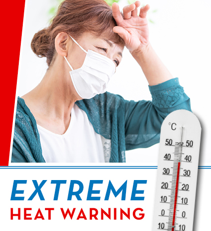 masked woman hand to forehead, text reads Extreme Heat Warning