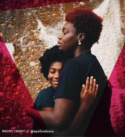 mother and daughter embracing