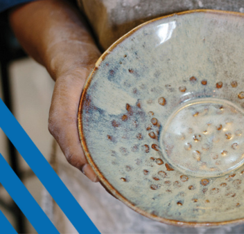 Woman holding ceramic bowl